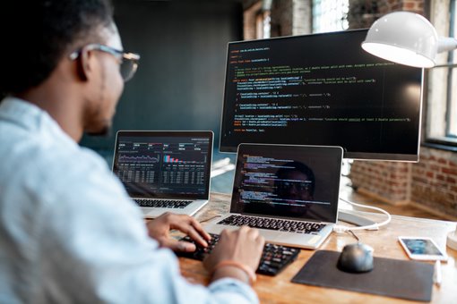 person with computers 