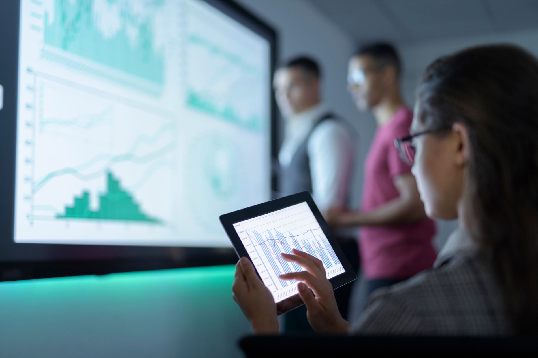 people looking at graphs 