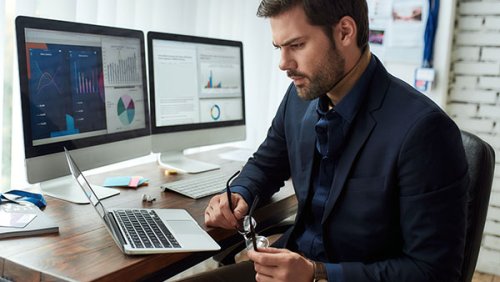 Man in suit working 